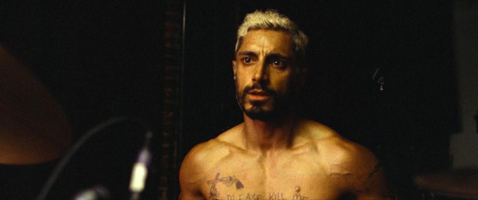 Riz Ahmed plays the drums shirtless