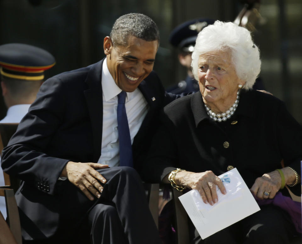 President Barack Obama laughs with former first lady Barbara Bush during the dedication of the George W. Bush presidential library on Thursday, April 25, 2013, in Dallas. (AP Photo/David J. Phillip)