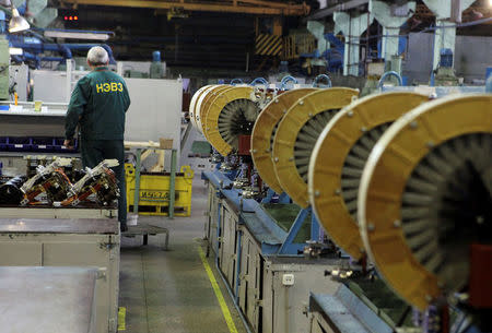 An employee works at Novocherkassk Electric Locomotive Plant (NEVZ) in Novocherkassk, in Rostov-on-Don region, Russia, May 5, 2014. REUTERS/Interpress/Viktor Pogontsev