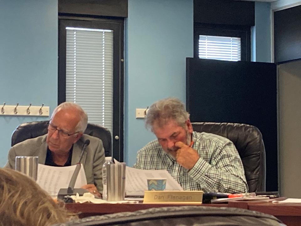 Delaware County Council members Jim Mochal (right) and Dan Flanagan, go over budget figures Thursday as the council look for places to cut the 2024 budget.
