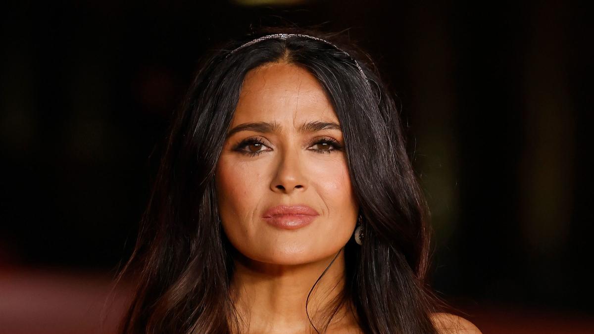 At 57, Salma Hayek Shows Off Super Toned Arms in a Plunging Red Carpet Look