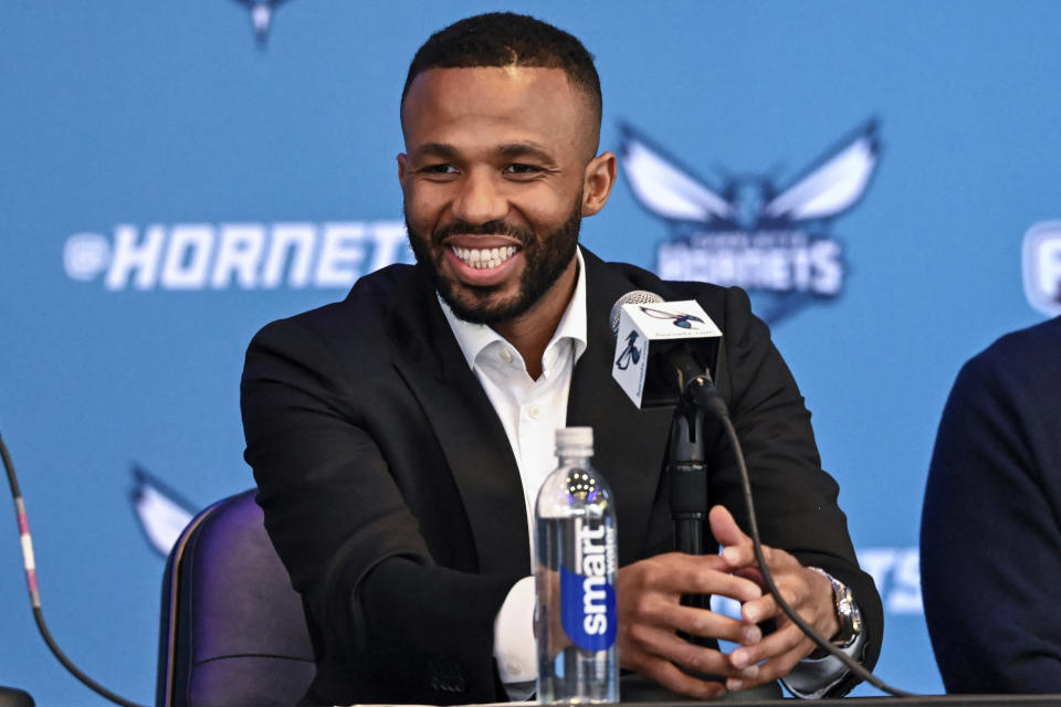 Charlotte Hornets new executive vice president of basketball operations Jeff Peterson smiles during an NBA basketball press conference, Wednesday, March 6, 2024, in Charlotte, N.C. (AP Photo/Matt Kelley)