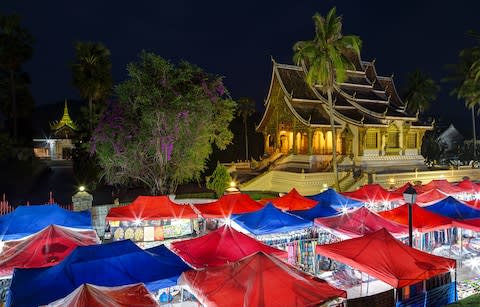 The night market and Haw Pha temple - Credit: Getty