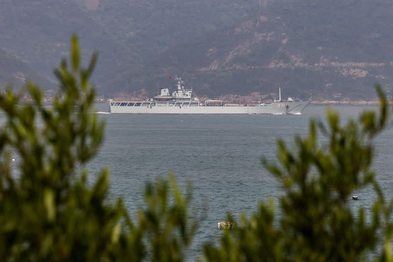 A Chinese warship sails during a military drill near Fuzhou, Fujian Province, near the Taiwan-controlled Matsu Islands