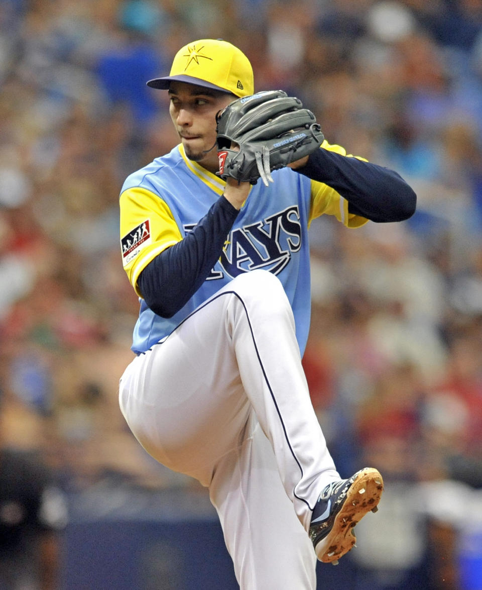 Tampa Bay Rays starter Blake Snell pitches against the Boston Red Sox during the third inning of a baseball game Sunday, Aug. 26, 2018, in St. Petersburg, Fla. (AP Photo/Steve Nesius)