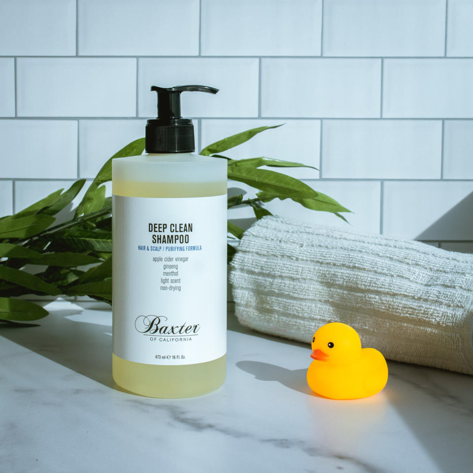 baxter shampoo on marble with tile background with rubber duckie