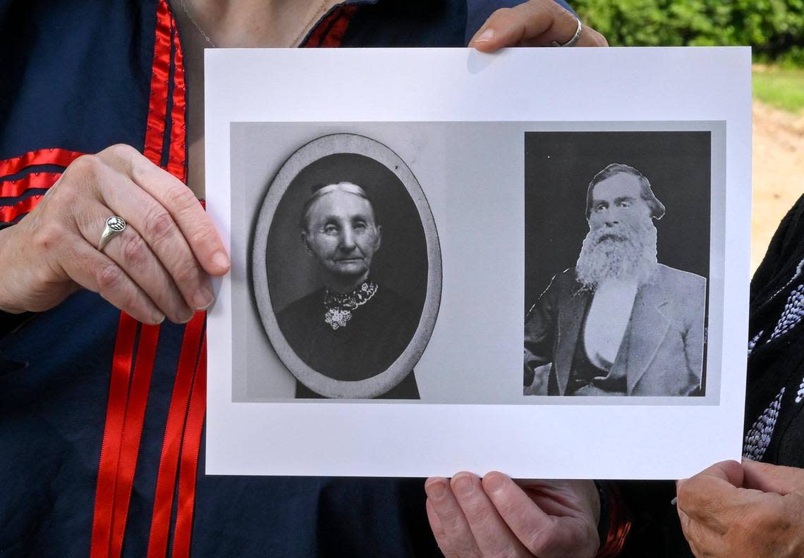 Quindaro descendants Holly Zane and Kristen Zane hold a photograph of their great-great-grandparents, Wyandot indigenous abolitionists, Rebecca Ann (Barnes) Zane and Ebenezer Orliss Zane Sr. The couple owned the Wyandot House Hotel in Quindaro and helped to safeguard escaped enslaved people.