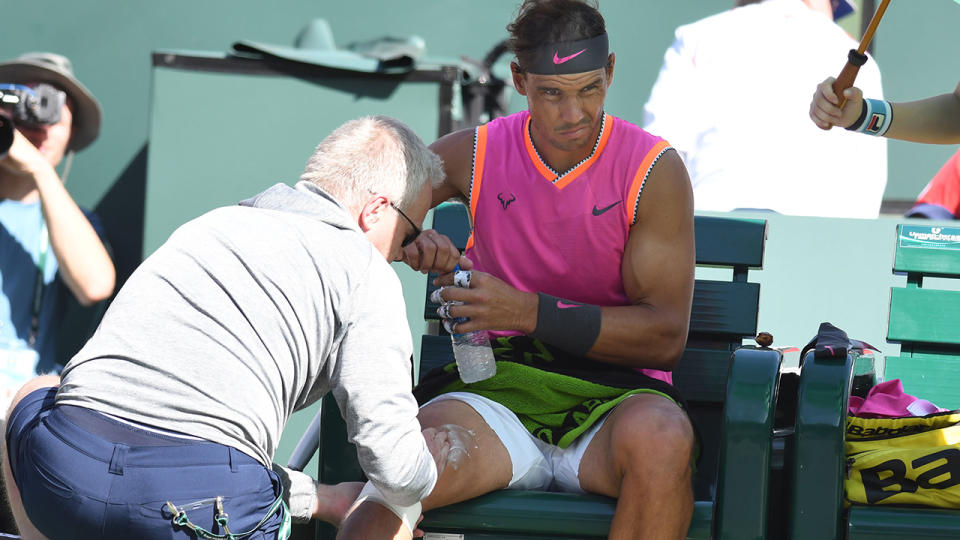 Rafael Nadal getting treatment from the ATP trainer. (Photo by Cynthia Lum/Icon Sportswire via Getty Images)