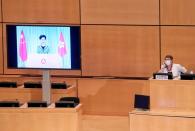 Lam, chief executive of Hong Kong, addresses by video link the Human Rights Council in Geneva