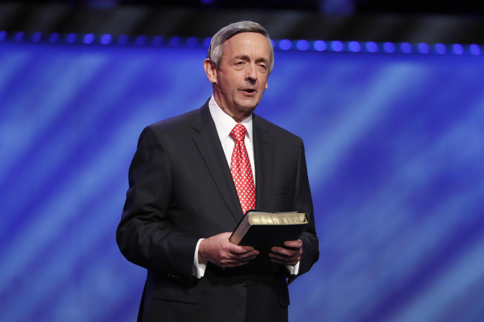 FILE - In this Sunday, June 28, 2020 file photo, Senior Pastor Dr. Robert Jeffress addresses attendees at First Baptist Church Dallas during a Celebrate Freedom Rally in Dallas. Jeffress believes a majority of his congregation welcome the COVID-19 vaccines, while some have doubts about their safety or worry they have links to abortion. Jeffress is among numerous religious leaders who say the leading vaccines are acceptable given their remote, indirect links to lines of cells developed from aborted fetuses. (AP Photo/Tony Gutierrez)