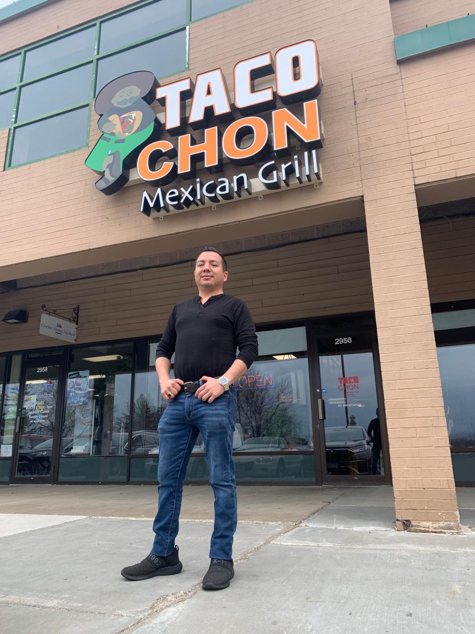 Taco Chon owner Juan Ramos stands in front of the St. Cloud location Thursday, April 28, 2022. He's being sued by Taco John's because of the similarity of their business names.