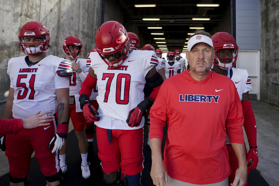 Liberty head coach Hugh Freeze may have coached his last game with the Flames on Saturday against New Mexico State as rumors swirl about his candidacy for the Auburn job. (AP Photo/Bryan Woolston)
