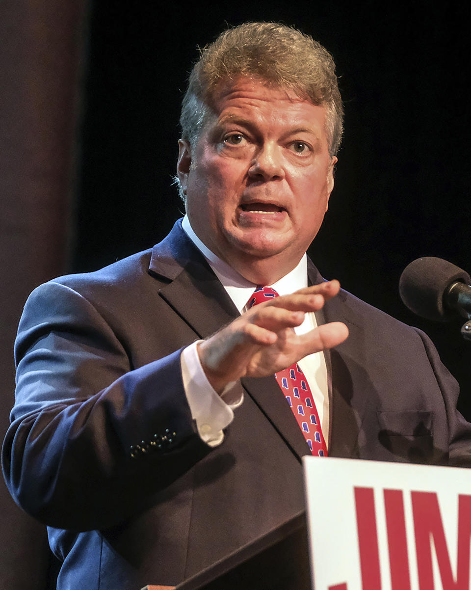 FILE - In this Aug. 6, 2019 file photograph, Democratic Attorney General Jim Hood, a gubernatorial candidate, speaks to supporters, in Jackson, Miss., after winning the party primary. Hood spoke Wednesday, Aug. 21, 2019, at a locally owned grocery store in the Delta town of Indianola of wanting to reduce the state's 7 percent sales tax on groceries to give working people a break. (AP Photo/Charles A. Smith, File)