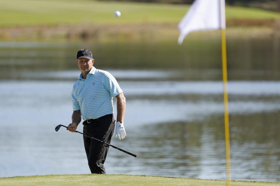 Dec 10, 2023; Bradenton, Florida, USA; Team InternationalÕs Retief Goosen chips up to the eighth hole during their morning round at The Concession Golf Club. Mandatory Credit: Jeff Swinger-USA TODAY Sports