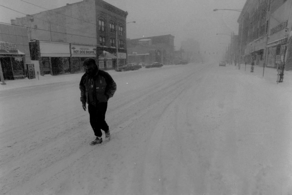 A resident in Beaver Falls braves the winter storm during the "Storm of the Century" on March 14, 1993.