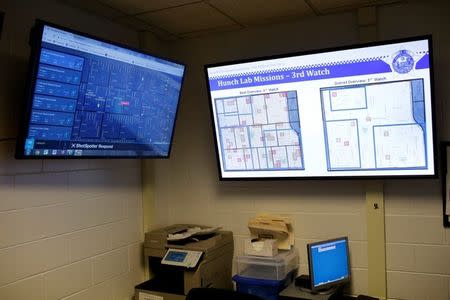 The Chicago Police Department Police Observation Devices, which helps control crime, are displayed on monitors at the 7th District police station in Chicago, Illinois, U.S. January 5, 2018. REUTERS/Joshua Lott