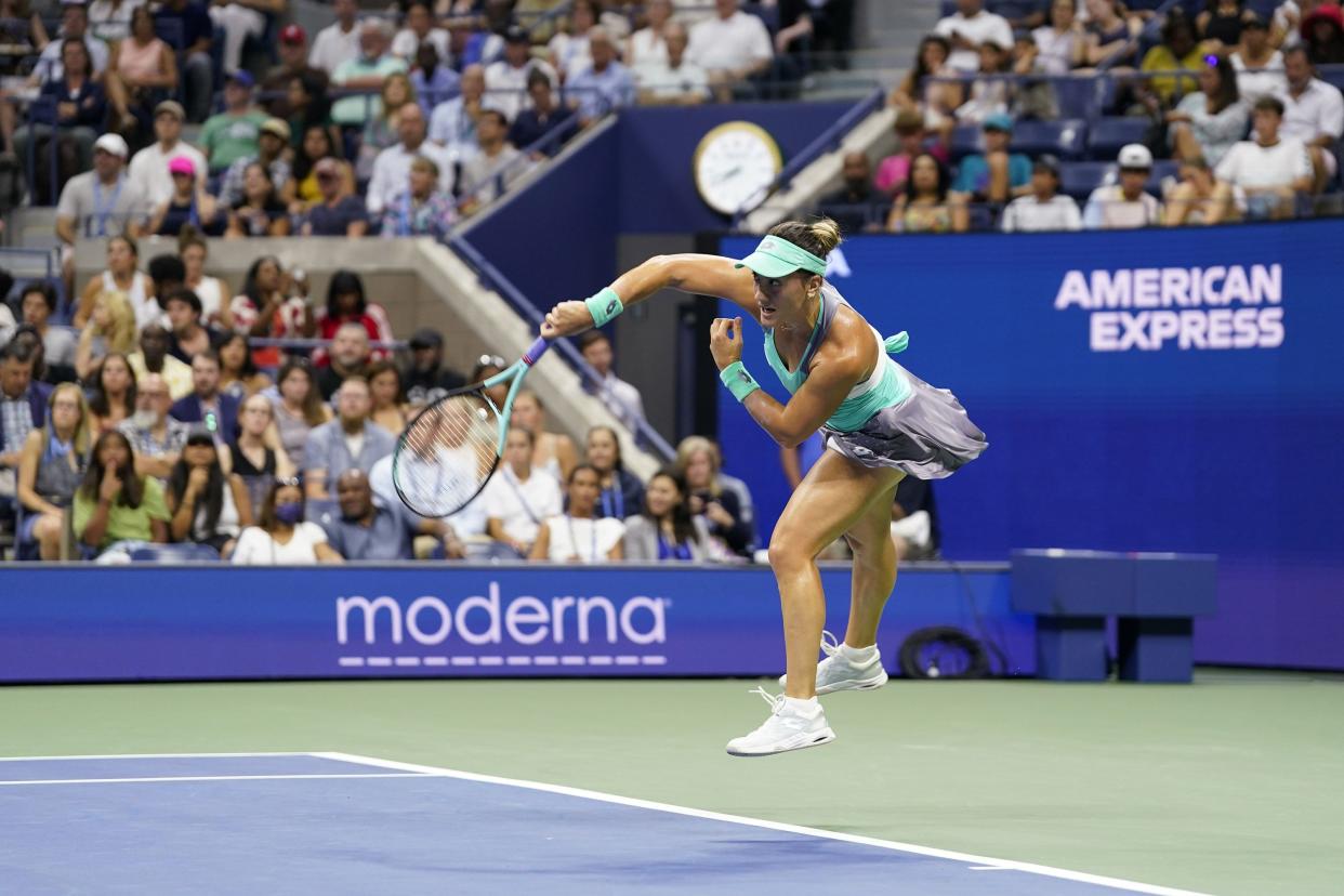 Danka Kovinic, of Montenegro, serves to Serena Williams, of the United States, during the first round of the U.S. Open tennis championship on Monday, Aug. 29, 2022, in New York.