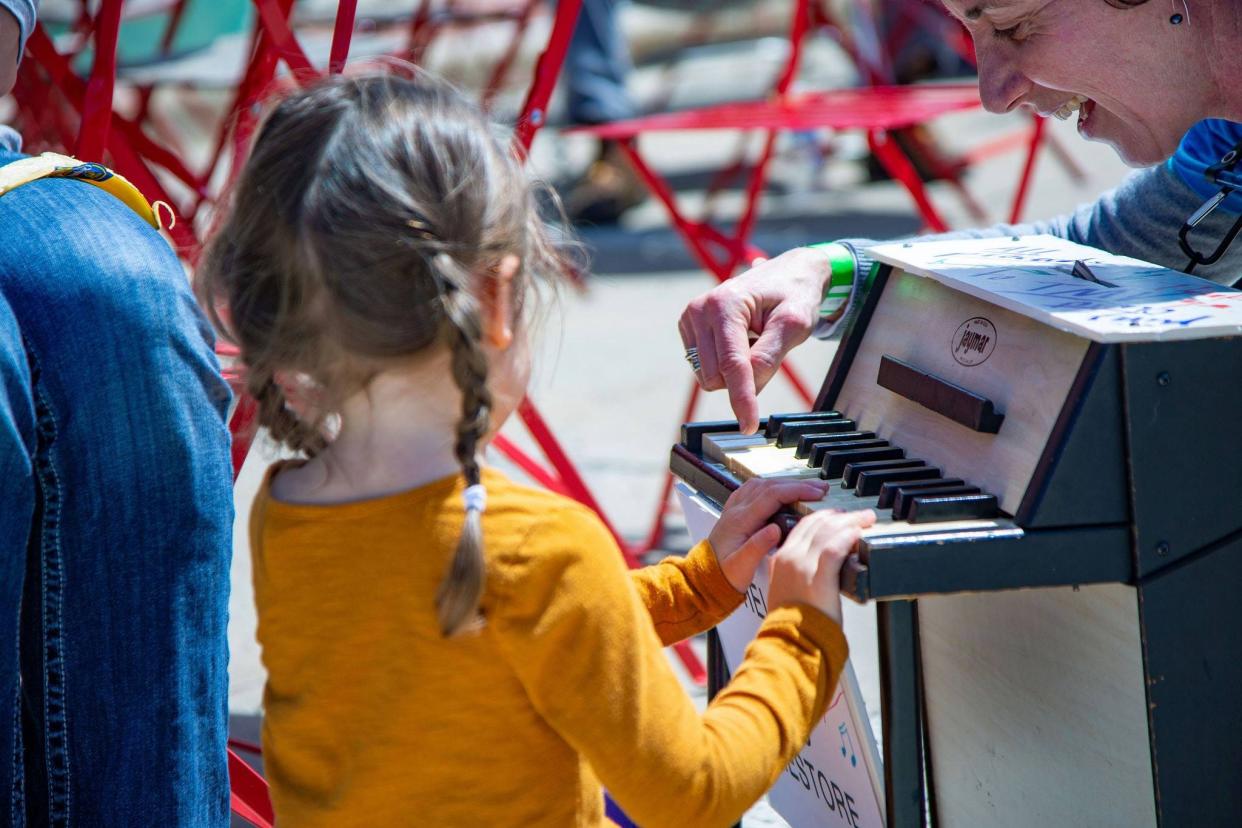A child tries a keyboard at The Music Village's 2019 Block Party in South Bend. The 2024 Block Party takes place May 11, 2024, at Howard Park.