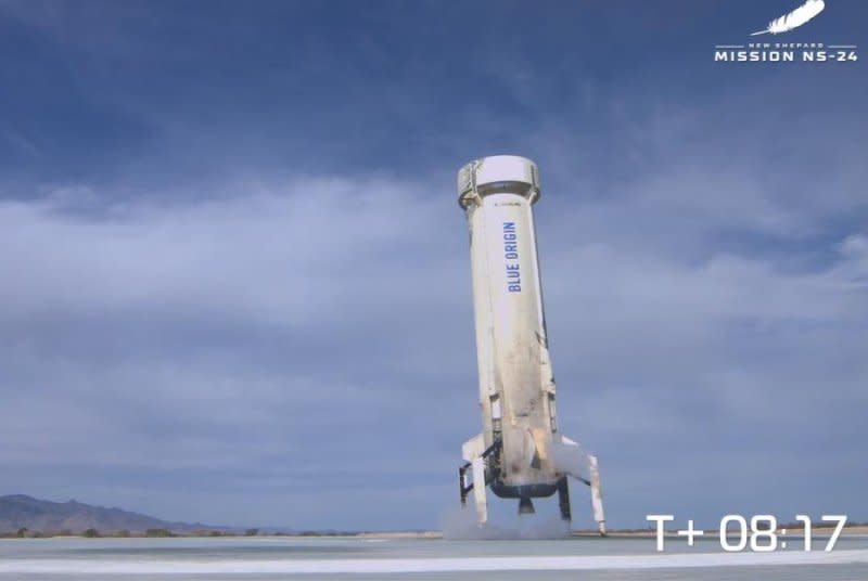 The booster returns to the landing pad after launching The 24th mission of Blue Origin's New Shepard suborbital rocket in West Texas on Tuesday. Screenshot via Blue Origin