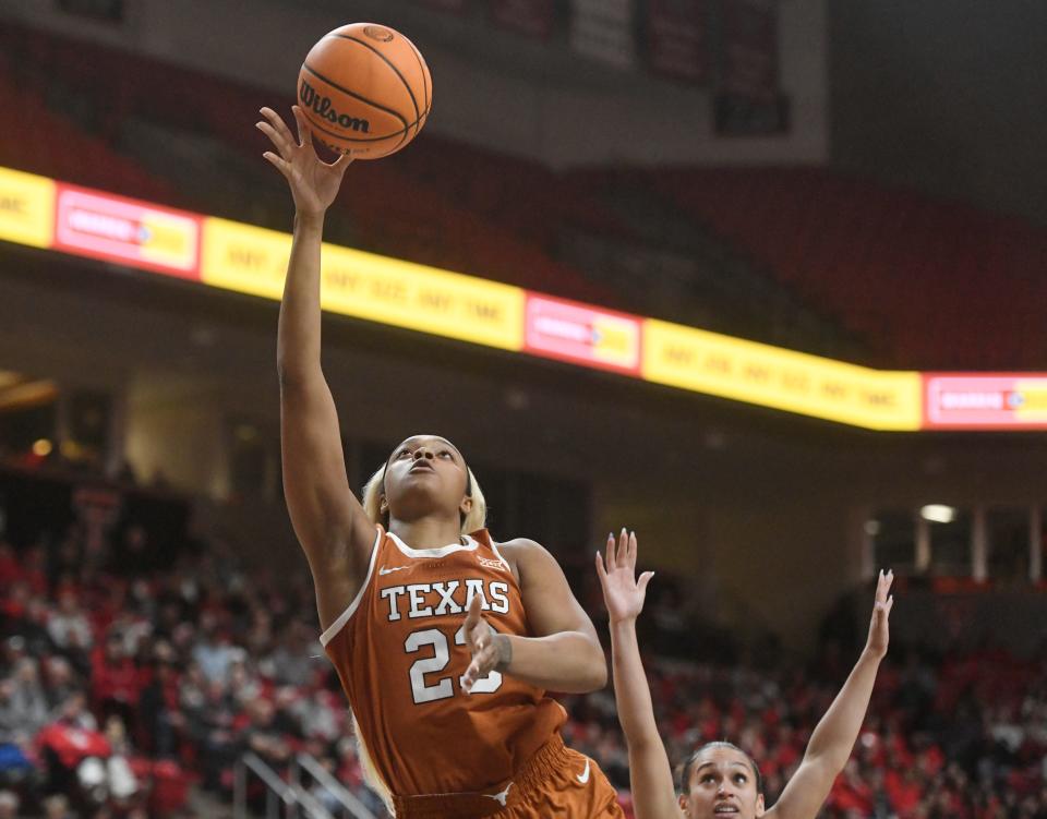 Texas forward Aaliyah Moore puts up a shot during the Longhorns' 74-47 win at Texas Tech on Wednesday night. Moore finished with 18 points and 12 rebounds to lead No. 10 Texas.