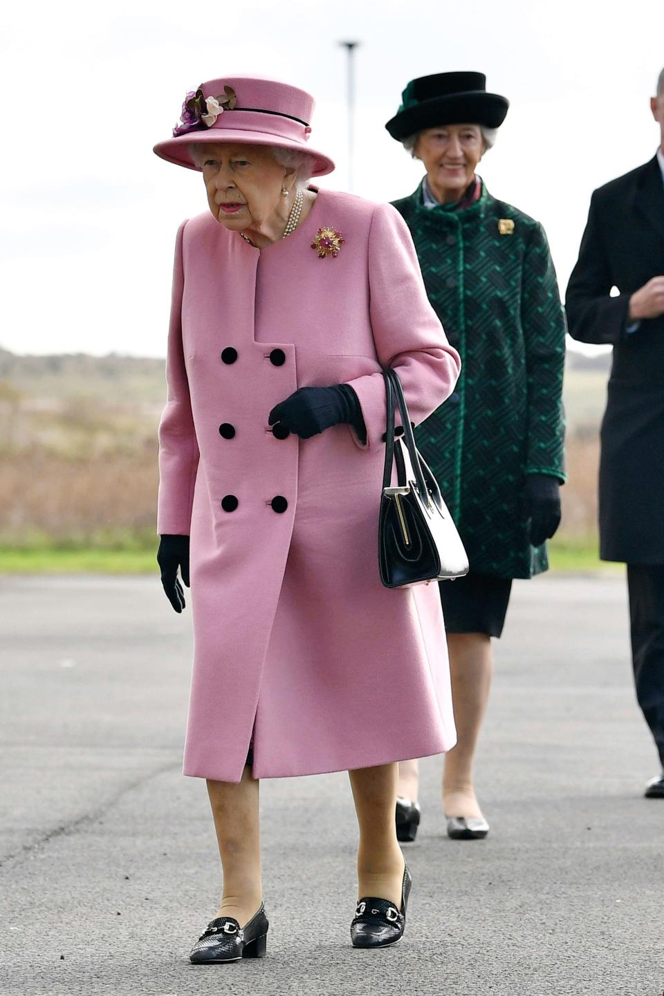 Britain's Queen Elizabeth II arrives for a visit to the Defence Science and Technology Laboratory (DSTL) at Porton Down, England, Thursday Oct. 15, 2020, to view the Energetics Enclosure and display of weaponry and tactics used in counter intelligence.