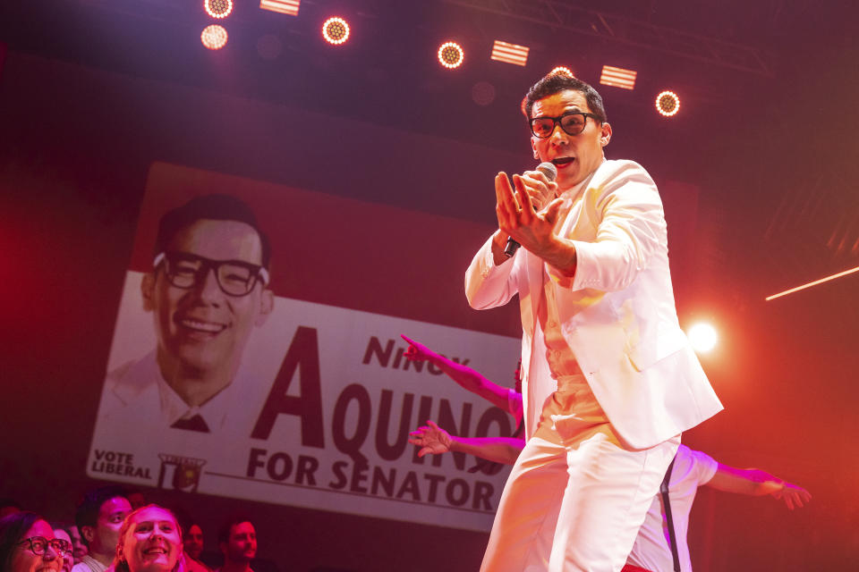 This image released by Boneau/Bryan-Brown shows Conrad Ricamora during a performance of "Here Lies Love," opening July 20 at the Broadway Theatre in New York. (Boneau/Bryan-Brown via AP)