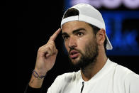 Matteo Berrettini of Italy reacts during his semifinal against Rafael Nadal of Spain at the Australian Open tennis championships in Melbourne, Australia, Friday, Jan. 28, 2022. (AP Photo/Andy Brownbill)