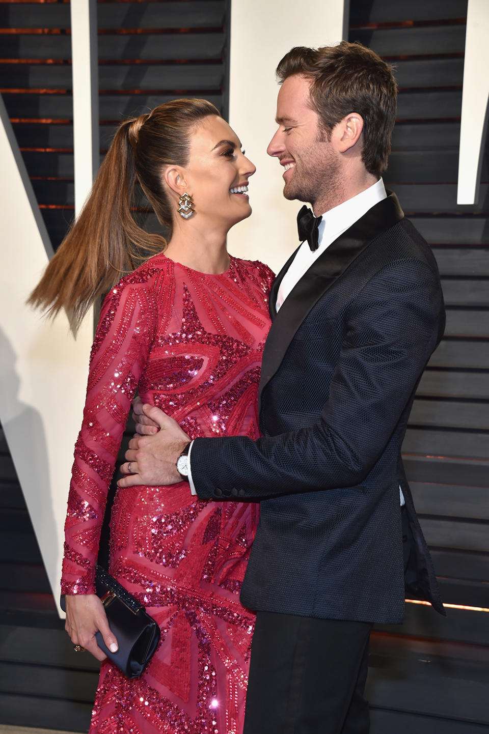 Armie Hammer and Elizabeth Chambers pose on the red carpet