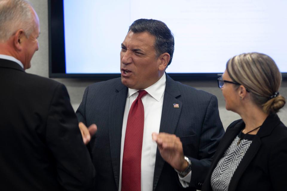 Commissioner Rick LoCastro speaks after the Collier County Board of Commissioners approved acting county manager Amy Patterson, right, as its new county manager, Thursday, June 16, 2022, in the Board of County Commissioners Chambers at the Collier County Government Center in Naples, Fla.