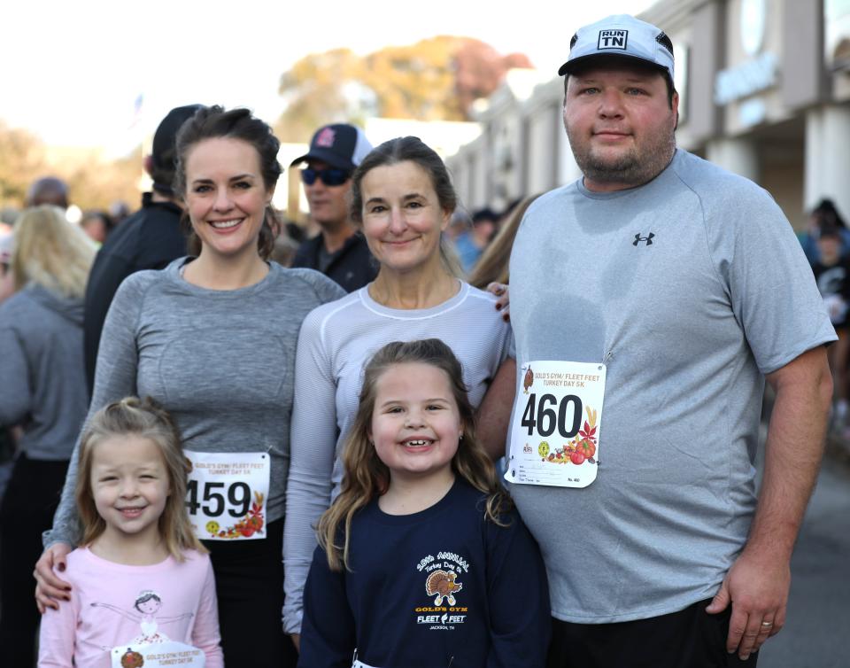 Family and friends came out to support Clara Barrow,, W Barrow, V Barrow, and William Barrow as they participated in the 18th Annual Turkey Day 5K sponsored by Gold's Gym and Fleet Feet on Thursday, November 24, 2022, in Jackson, Tennessee.