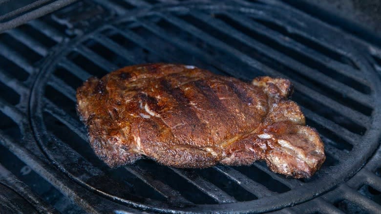 steak on grill with grill marks