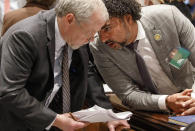 Chief prosecuting attorney Creighton Waters huddles trial attorney Justin Bamberg during the discussions about which jurors to strike from the final panel during Alex Murdaugh's double murder trial at the Colleton County Courthouse in Walterboro, S.C, Wednesday, Jan. 25, 2023. (Grace Beahm Alford/The State via AP)