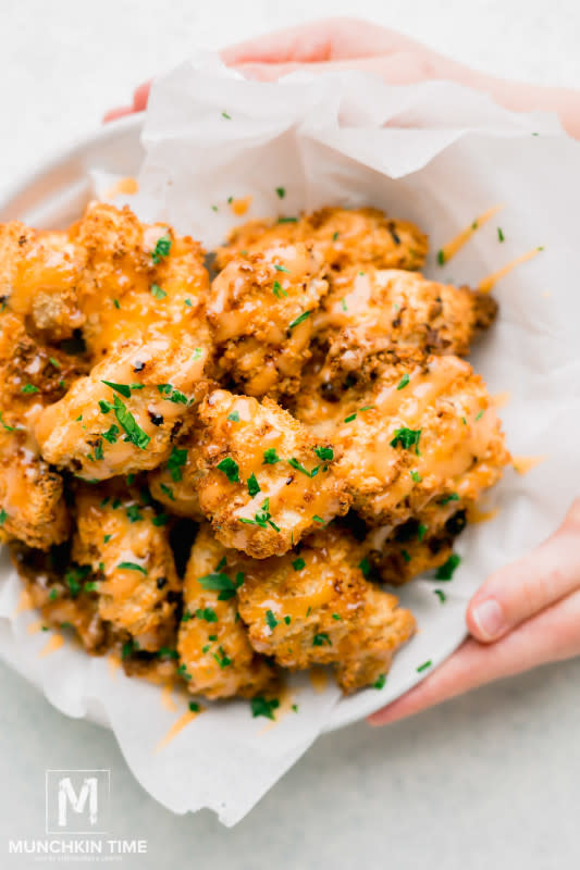 <p>30-minute Bang Bang chicken recipe in air fryer – incredibly crispy air fried chicken nuggets. They taste amazing! Crispy, juicy and delicious, made in just 30 minutes.</p><p><strong>Get the recipe: <a href="https://www.munchkintime.com/30-minute-bang-bang-chicken-recipe-in-air-fryer/" rel="nofollow noopener" target="_blank" data-ylk="slk:30-Minute Air Fryer Bang Bang Chicken;elm:context_link;itc:0;sec:content-canvas" class="link rapid-noclick-resp">30-Minute Air Fryer Bang Bang Chicken</a></strong></p>