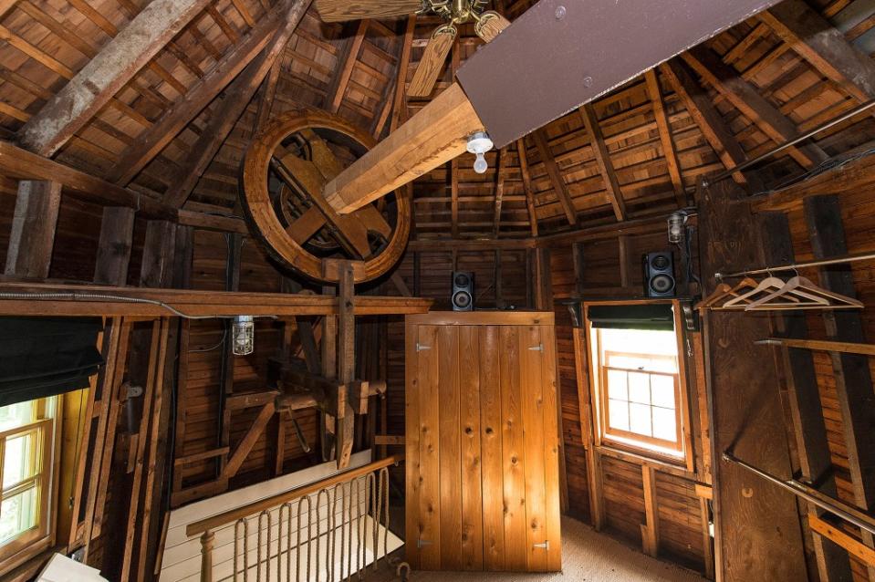 This top-level space still houses the windmill’s mechanicals — and, sheathed in cedar, can today be a great closet. Rise Media/Douglas Elliman