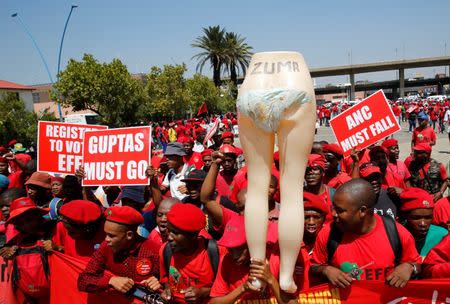 Members of the Economic Freedom Fighters (EFF) gather to march to South Africa's constitutional court in Johannesburg, February 9, 2015. REUTERS/Sydney Seshibedi