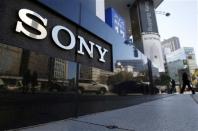 A logo of Sony Corp is seen outside its showroom in Tokyo February 5, 2014. Japanese electronics maker Sony Corp warned it expects a net loss of 110 billion yen ($1.1 billion) this fiscal year as it absorbs restructuring costs linked to its moves to exit the personal computer business. Picture taken February 5, 2014. REUTERS/Yuya Shino