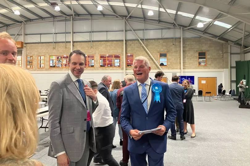 Stuart Andrew celebrating with Cllr Dan Lister (left), Conservative cabinet member on West Northamptonshire Council.