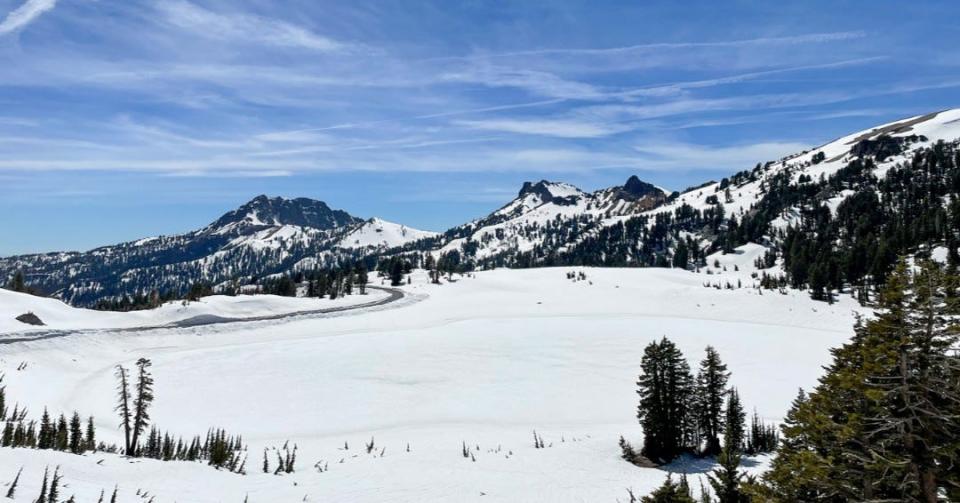 Snow covers Lake Helen at Lassen Volcanic National Park. The park road will open Friday, June 3, 2022.