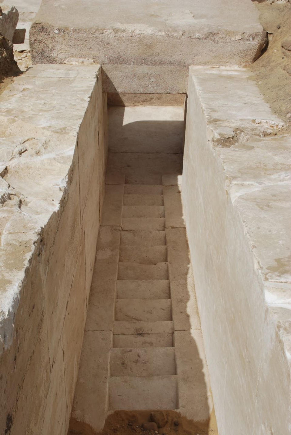 Within the remains of the pyramid, archaeologists found a corridor with steps. <cite>Egyptian Ministry of Antiquities</cite>
