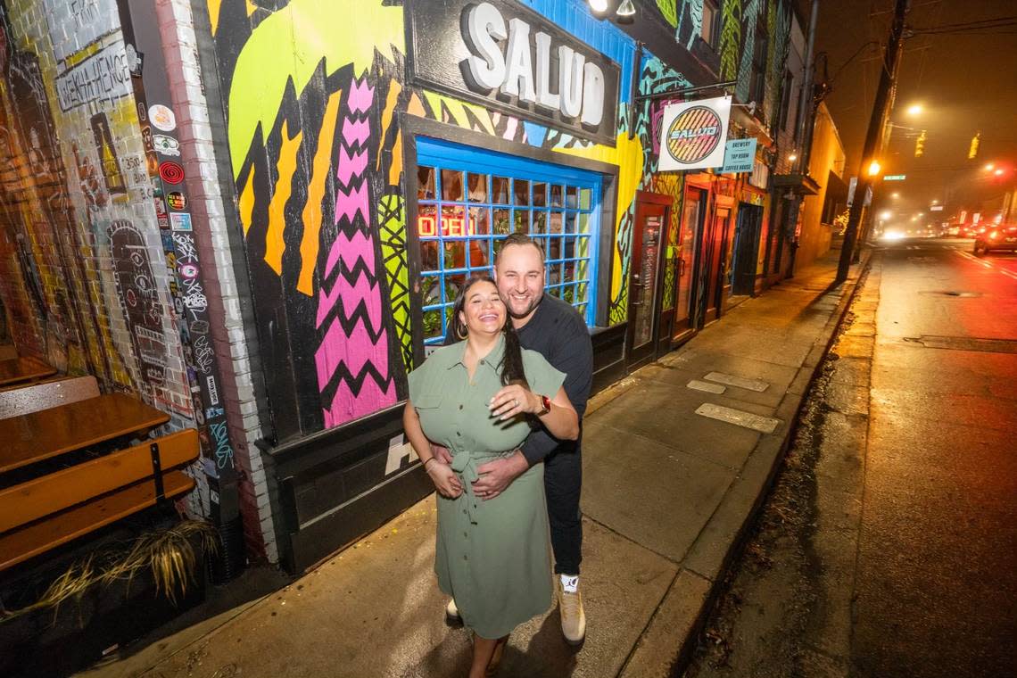 Dairelyn and Jason Glunt in front of Salud Cerveceria.