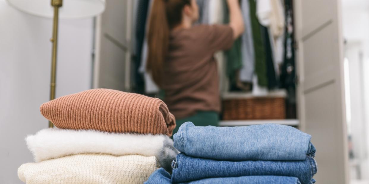 woman cleaning out closet - what we need changes