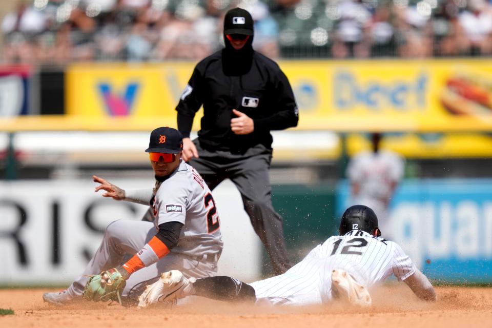 Chicago White Sox pinch runner Romy Gonzalez steals second as Detroit Tigers shortstop Javier Baez fields a throw from catcher Eric Haase and second base umpire Carlos Torres watches during the eighth inning at Guaranteed Rate Field in Chicago on Saturday, June 3, 2023.