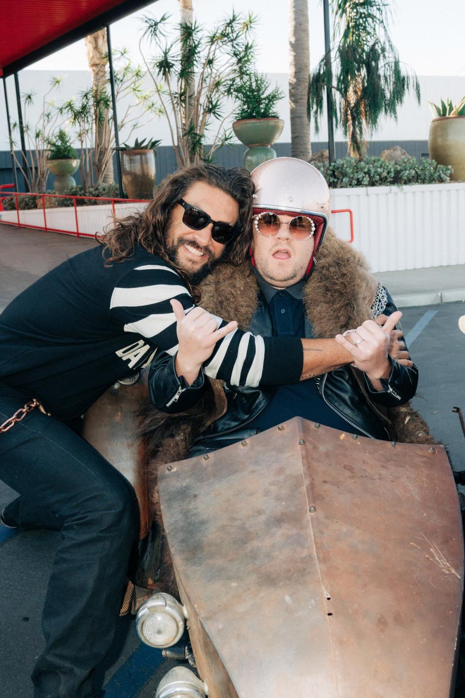 Jason Momoa takes host James Corden for a ride in his side car during the sketch "Two Hours Off" on <em>The Late Late Show </em>on Wednesday in Los Angeles.