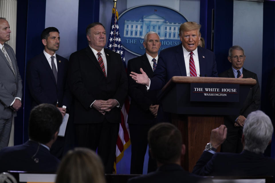 President Donald Trump responds to a question by NBC News White House correspondent Peter Alexander during a coronavirus task force briefing at the White House, Friday, March 20, 2020, in Washington. (AP Photo/Evan Vucci)