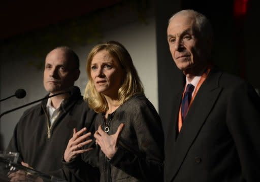 L-R: New York City Deputy Mayor Howard Wolfson, New York Road Runners president and CEO Mary Wittenberg and George Hirsch, Chairman of the New York Road Runners Board of Directors, hold a news conference to announce the cancellation of the 43rd New York Marathon