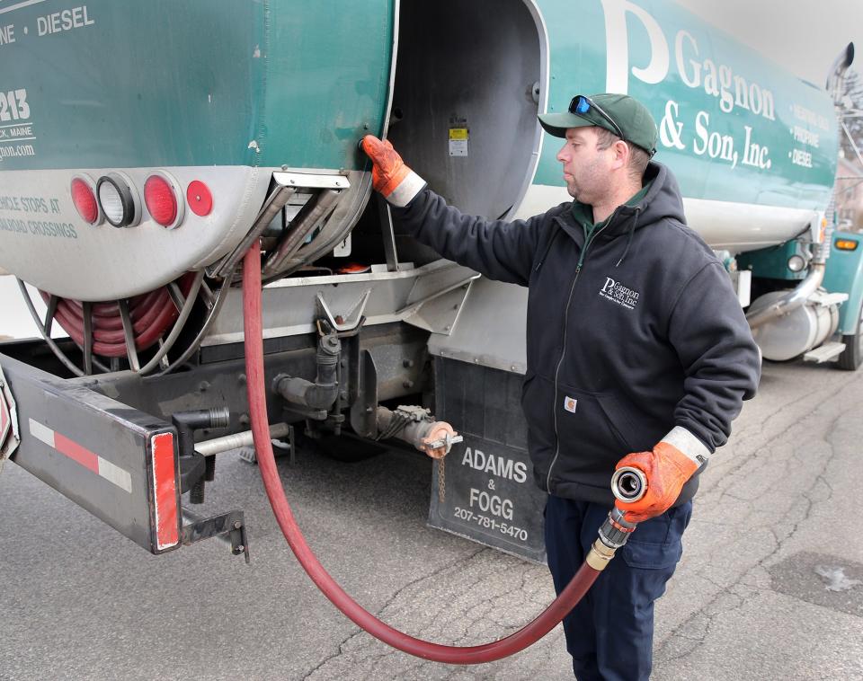 As a cold snap heads toward the Seacoast people are concerned with having enough home heating fuel to make it through. P. Gagnon and Son oil delivery driver Greg Holden makes a stop at a home in South Berwick, Maine, Thursday, Feb. 2, 2023.