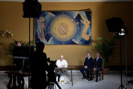 Pope Francis attends an audio-video connection with crew members of the International Space Station, ISS Expedition 53, at the Vatican October 26, 2017. Osservatore Romano/Handout via Reuters