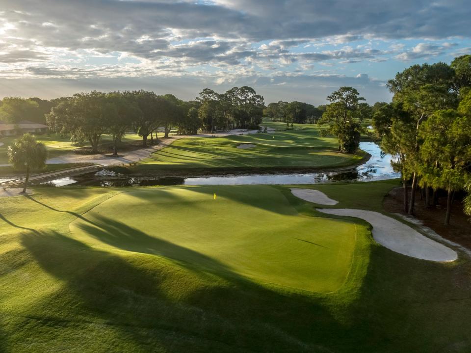 PGA National's nine-hole, par-3 course The Staple opened Thursday, July 1, 2021. On the fifth hole, pictured, golfers are encouraged to tee off from a bunker.