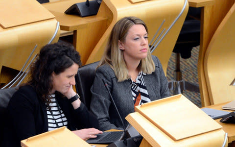 Jenny Gilruth (R), the partner of former Scottish Labour leader Kezia Dugdale, in the chamber of the Scottish Parliament - Credit: Corbis News