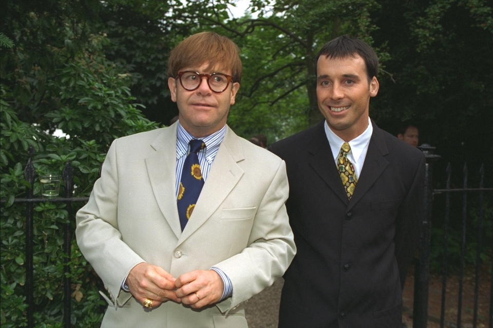 Couple Sir Elton John and David Furnish in suits and ties at celebrity society party in Chelsea (Photo by Tim Graham/Sygma/Corbis via Getty Images)